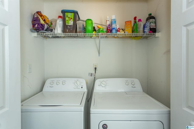 washroom with washing machine and dryer