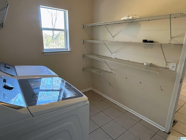 laundry area featuring tile patterned flooring