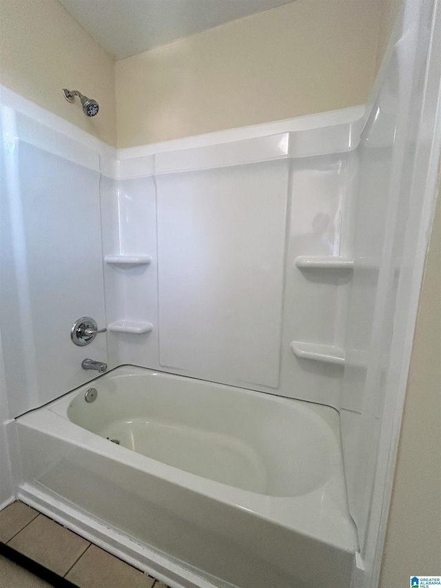 bathroom with shower / tub combination