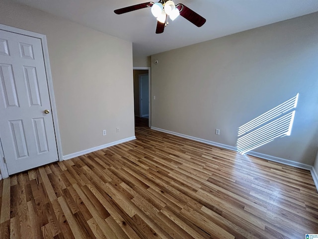 interior space featuring hardwood / wood-style flooring and ceiling fan