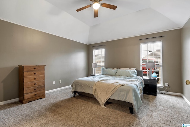 carpeted bedroom with vaulted ceiling and ceiling fan