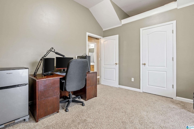 office featuring vaulted ceiling and light colored carpet