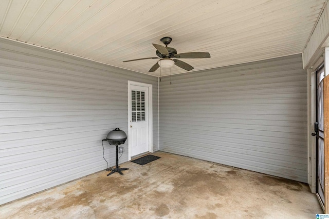 exterior space featuring ceiling fan