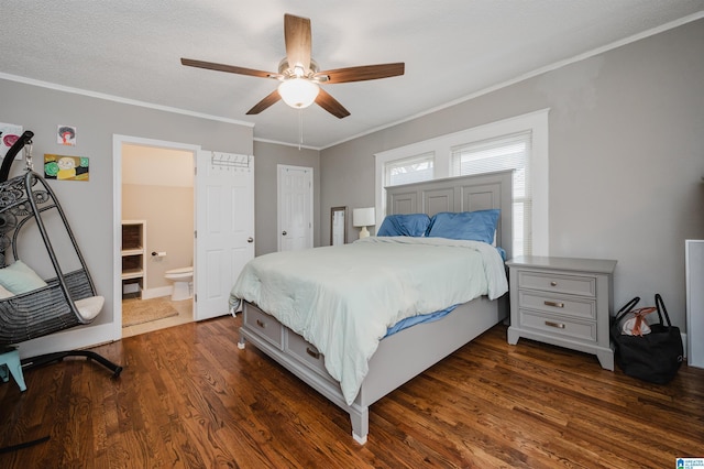 bedroom featuring dark hardwood / wood-style flooring, connected bathroom, ornamental molding, and ceiling fan