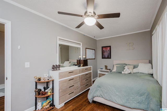 bedroom with crown molding, dark hardwood / wood-style floors, and ceiling fan