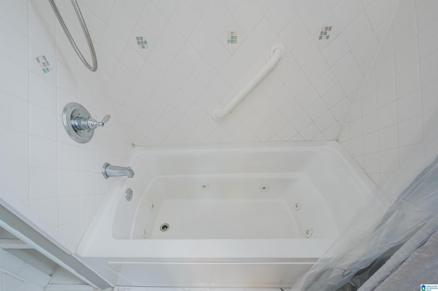 bathroom featuring shower / bathtub combination with curtain