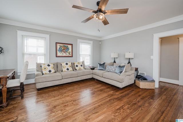 living room with ceiling fan, crown molding, dark hardwood / wood-style floors, and a healthy amount of sunlight