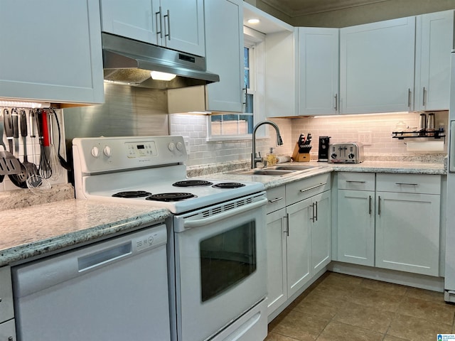 kitchen featuring white cabinetry, sink, white appliances, and backsplash