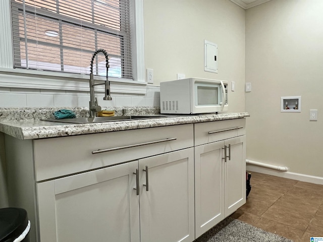 interior details featuring sink