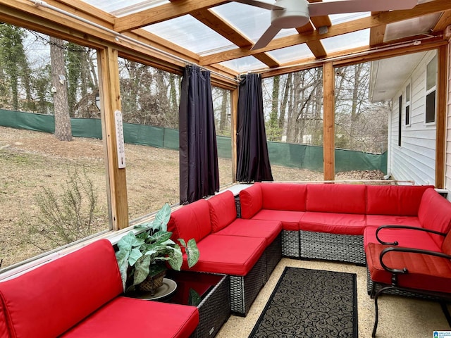 sunroom featuring coffered ceiling and a healthy amount of sunlight