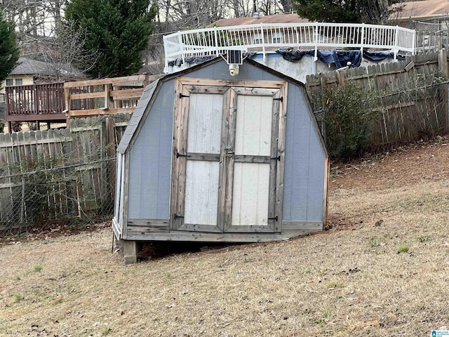 view of outbuilding with a yard