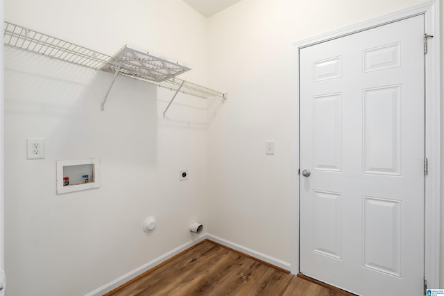 laundry room featuring hardwood / wood-style floors, hookup for an electric dryer, washer hookup, and hookup for a gas dryer