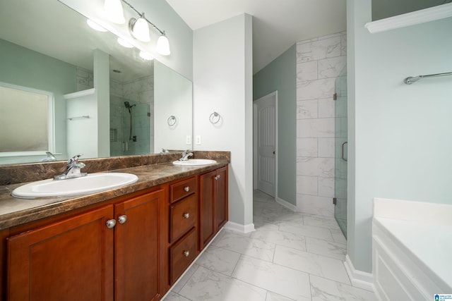 bathroom featuring vanity and an enclosed shower