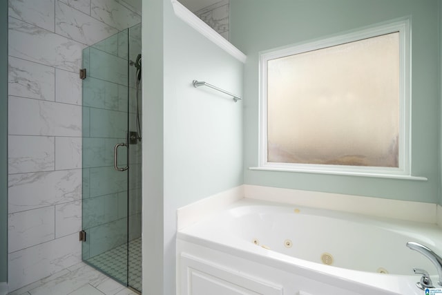 bathroom with separate shower and tub