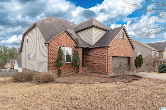 view of front of home featuring a garage and a front lawn