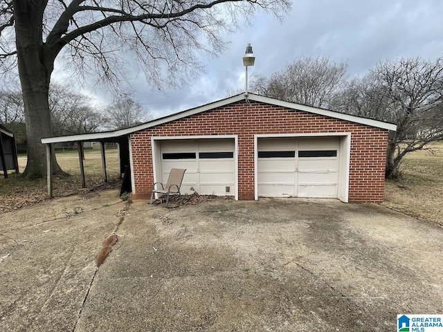 garage featuring a carport