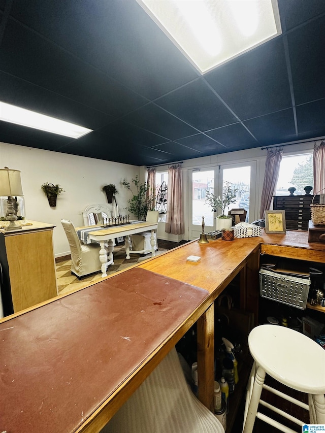 interior space featuring a paneled ceiling