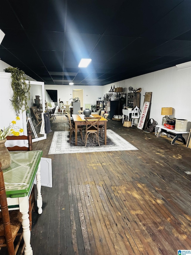 dining area with dark wood-type flooring