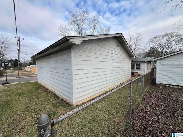 view of home's exterior featuring a yard