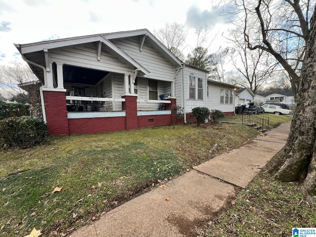 view of property exterior featuring a yard