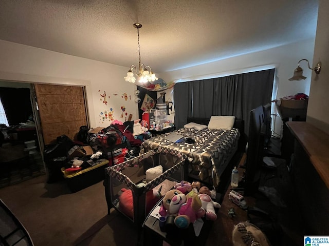 carpeted bedroom featuring a textured ceiling and a notable chandelier