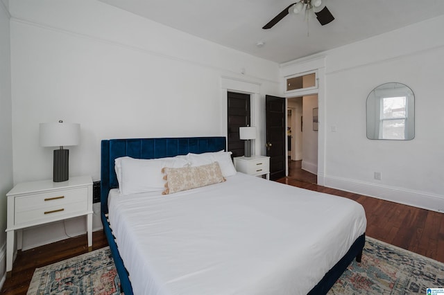 bedroom featuring ceiling fan and dark hardwood / wood-style flooring