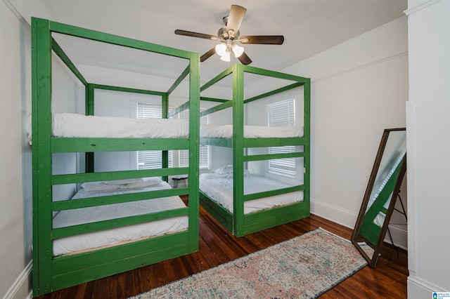 bedroom featuring dark wood-type flooring