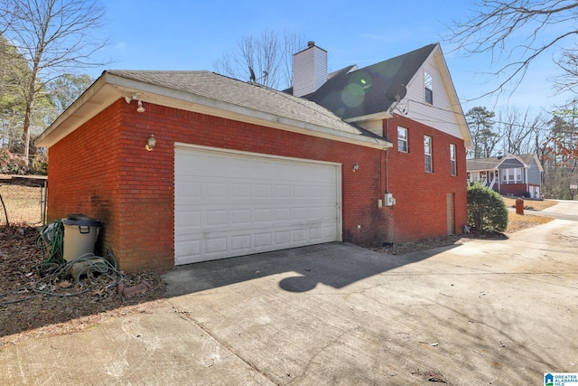 view of property exterior featuring a garage