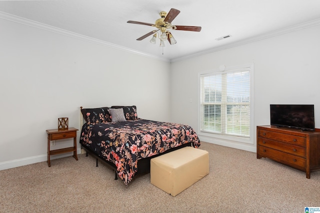 bedroom featuring ornamental molding, light carpet, and ceiling fan