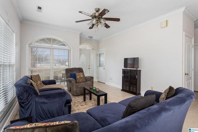 tiled living room featuring crown molding and ceiling fan