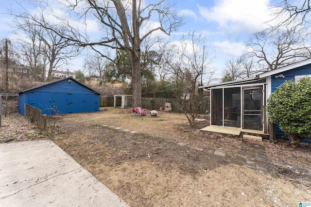 view of yard with a sunroom