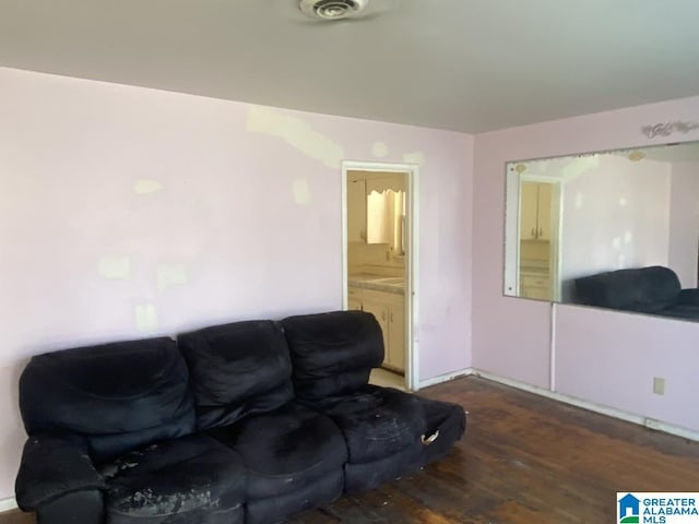 living room with dark hardwood / wood-style flooring