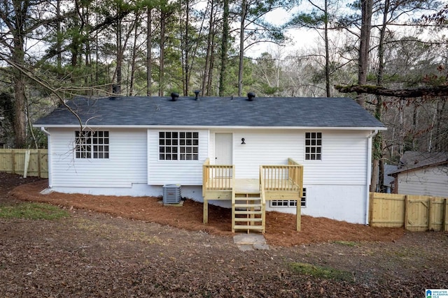 back of property featuring cooling unit