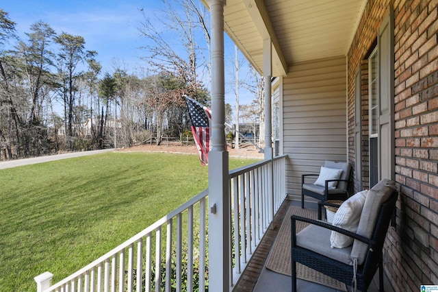 balcony featuring covered porch