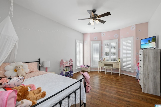 bedroom featuring dark hardwood / wood-style floors and ceiling fan