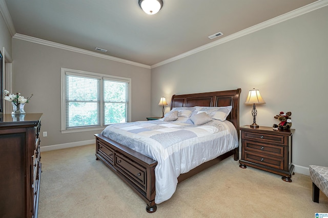 bedroom featuring crown molding and light colored carpet