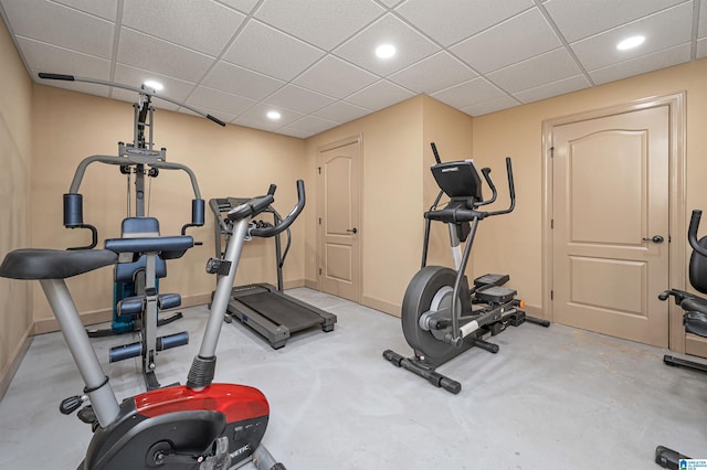 exercise room featuring a paneled ceiling