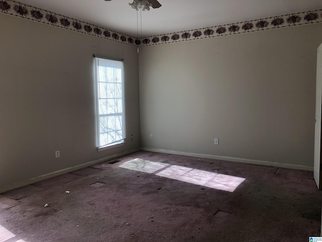 unfurnished room with ceiling fan