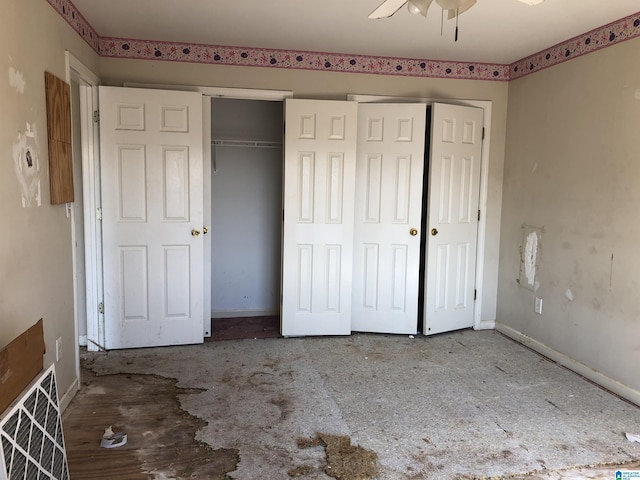 unfurnished bedroom with multiple closets