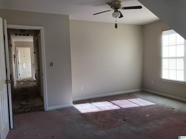 empty room featuring ceiling fan