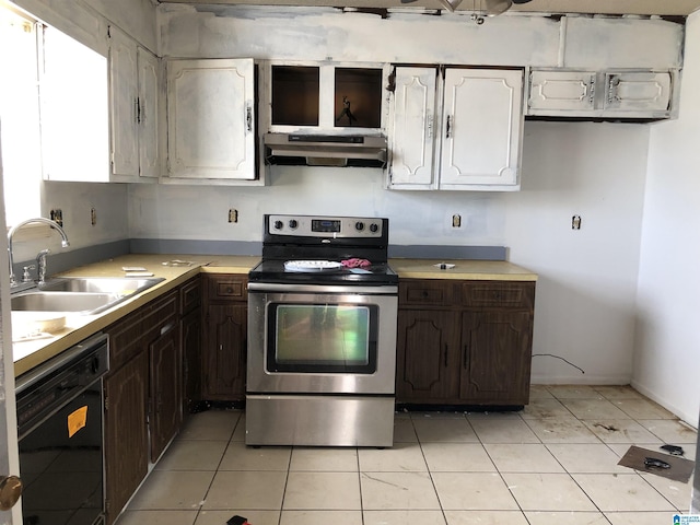 kitchen with light tile patterned flooring, sink, dark brown cabinets, black dishwasher, and stainless steel electric stove