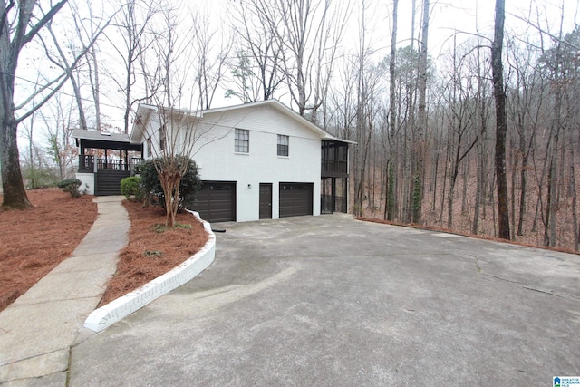 view of property exterior featuring a garage