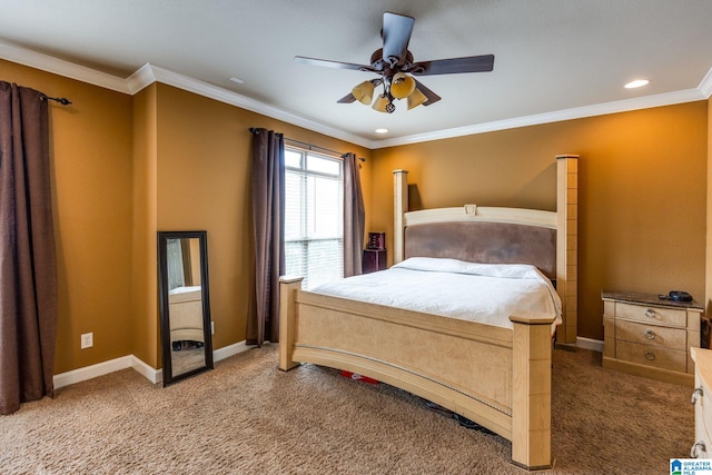 carpeted bedroom with ceiling fan and crown molding