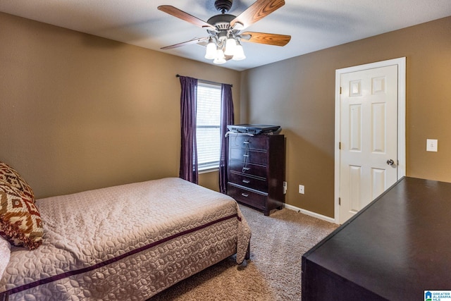 bedroom with ceiling fan and carpet floors