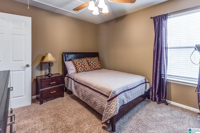 carpeted bedroom with ceiling fan