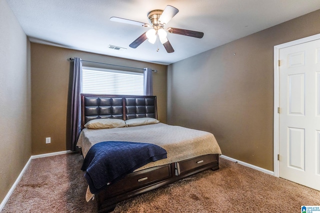 carpeted bedroom with ceiling fan