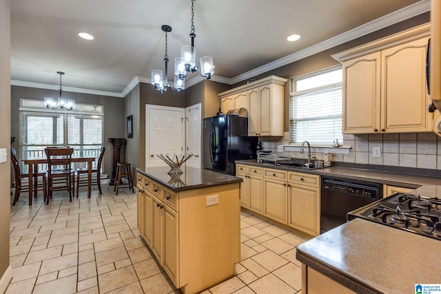 kitchen featuring a notable chandelier, a kitchen island, decorative light fixtures, black appliances, and tasteful backsplash