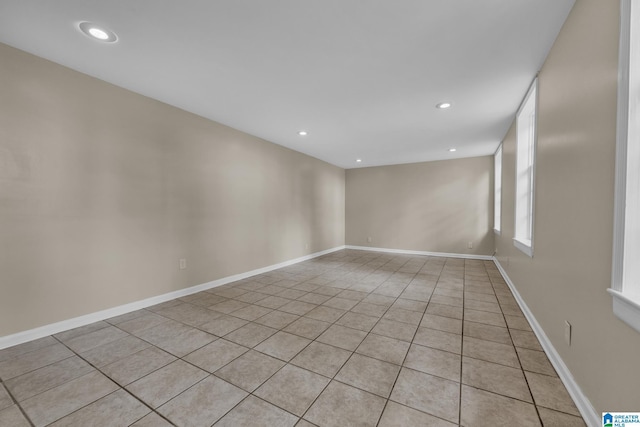 empty room featuring light tile patterned flooring