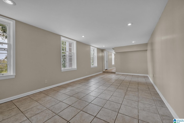 empty room with light tile patterned flooring