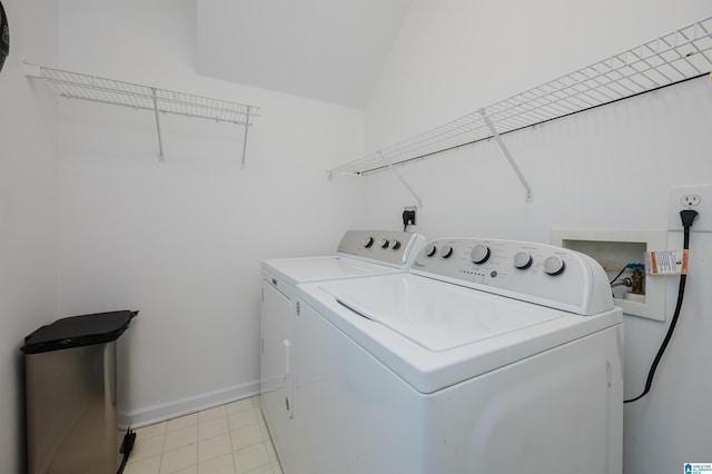 clothes washing area featuring washing machine and clothes dryer